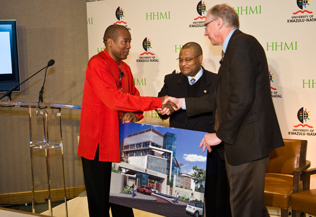 His Excellency Welile Nhlapo shakes hands with Professor Malegapuru William Makgoba and Cech