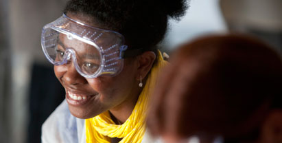 Woman in lab goggles